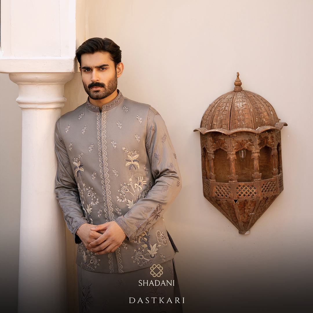Close-up of a tailored waistcoat paired with a traditional kurta pajama, showcasing intricate craftsmanship.